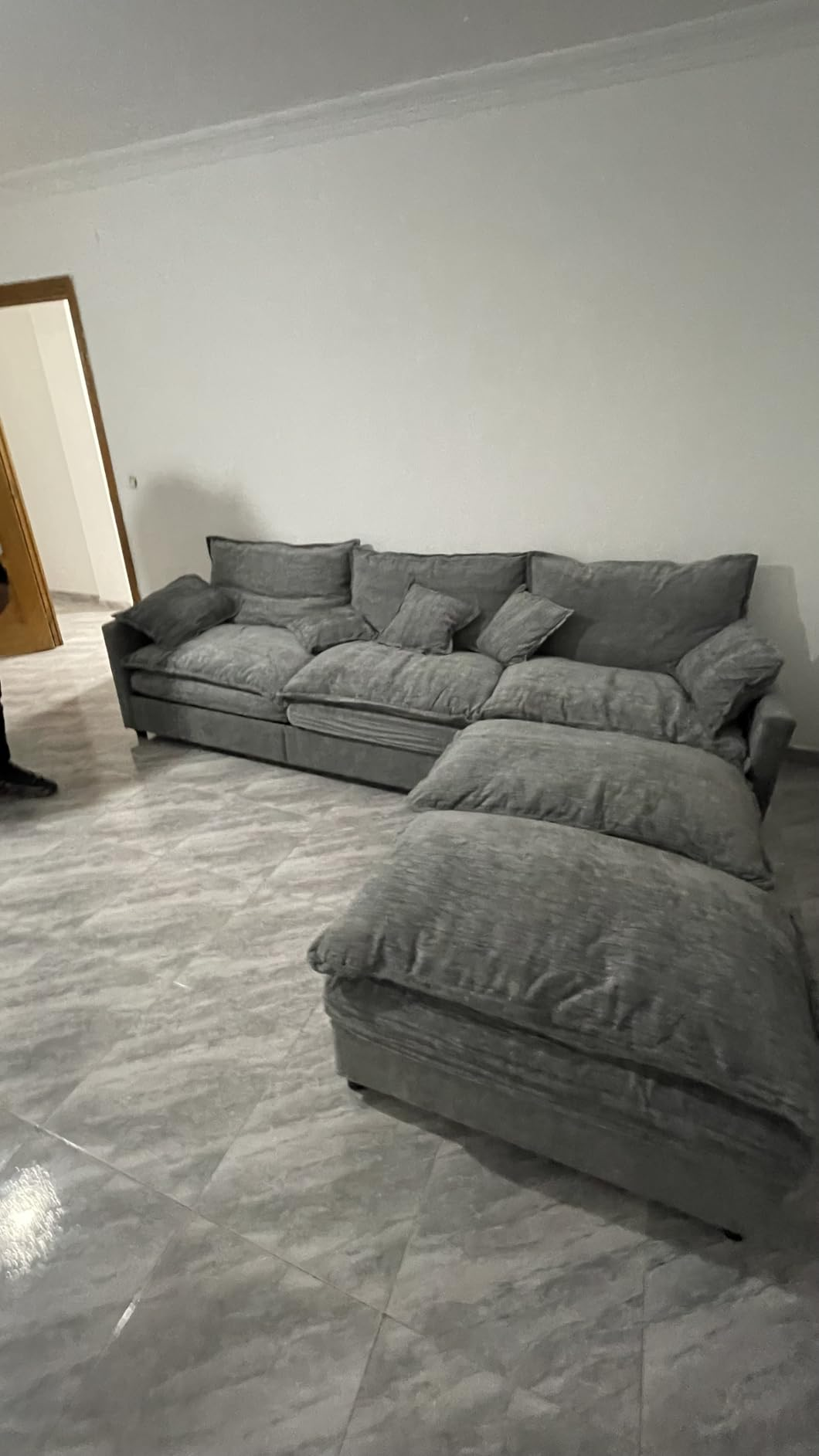 Customer photo of the sofa in a grey living room