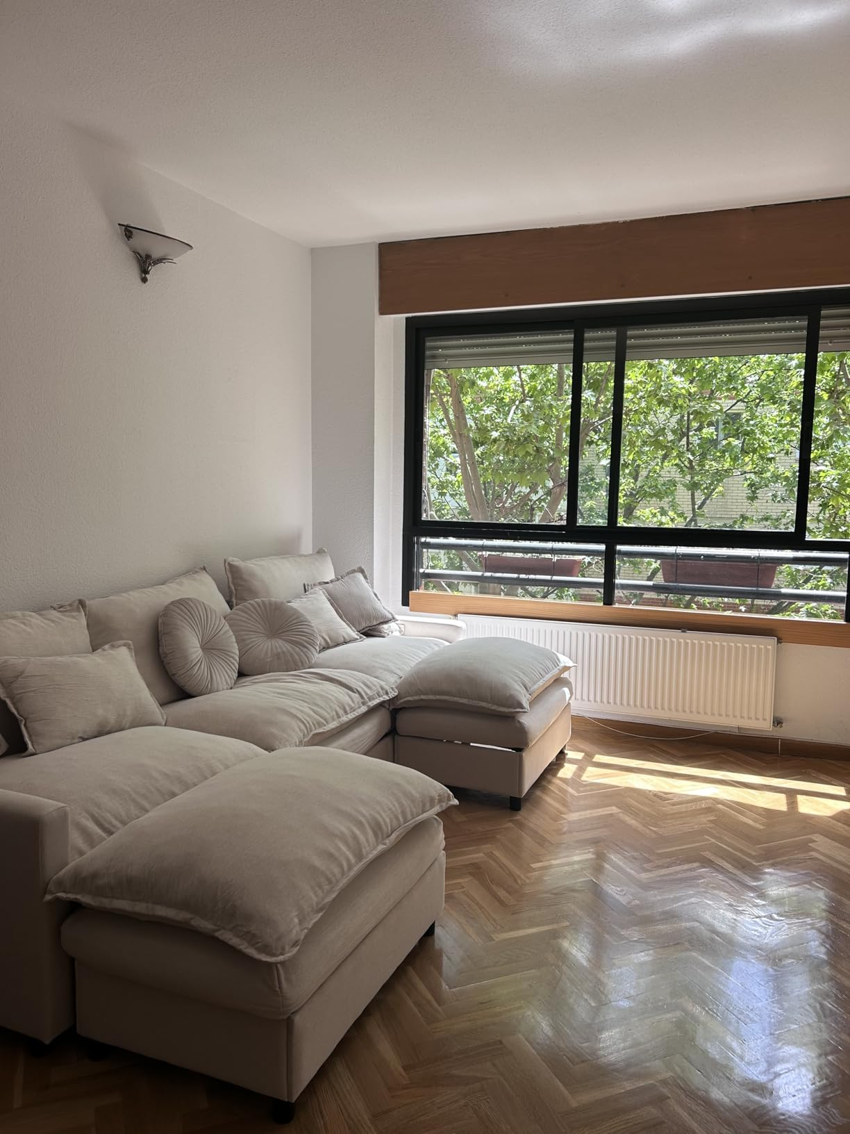Customer photo of the sofa by the window
